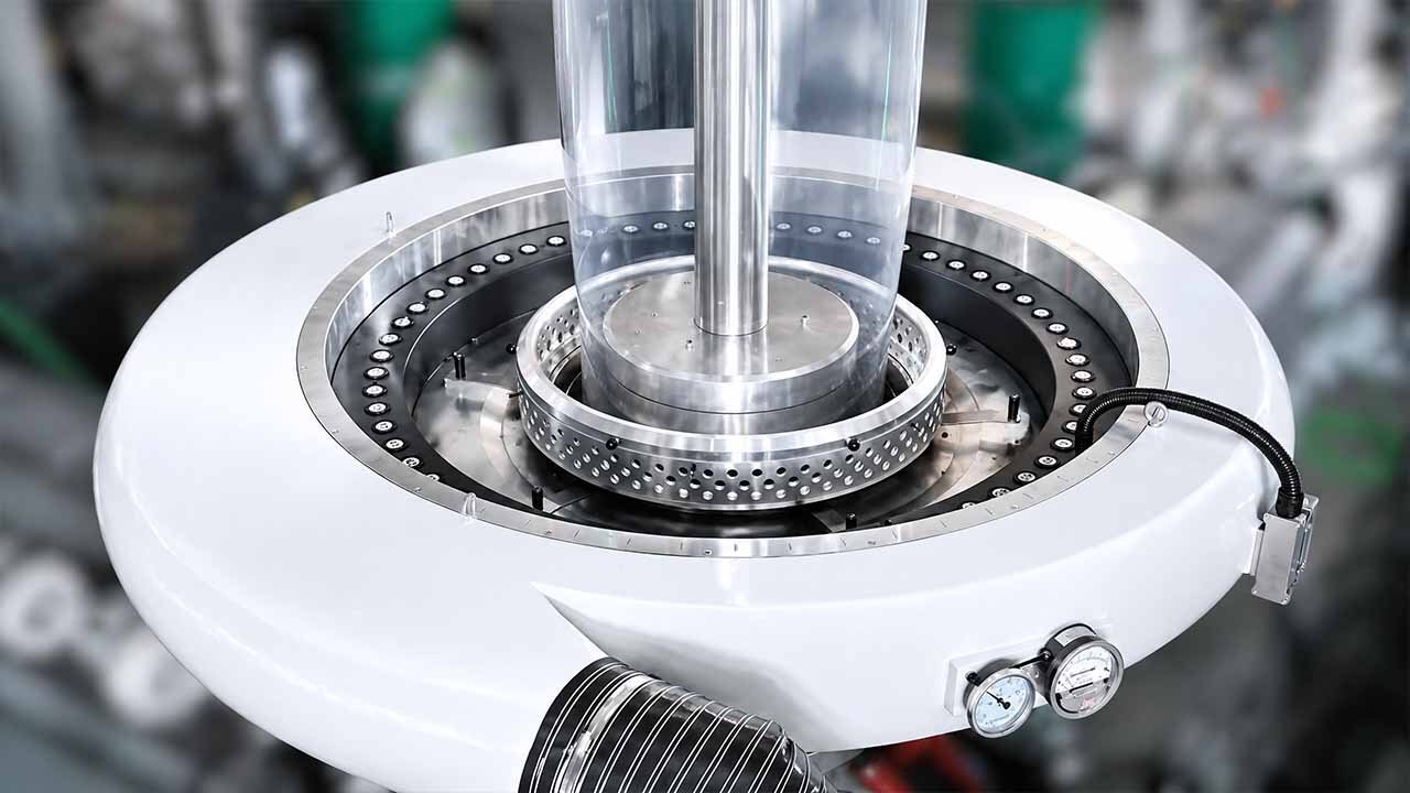 Blown film air ring cooling and haul-off rollers — film thickness control