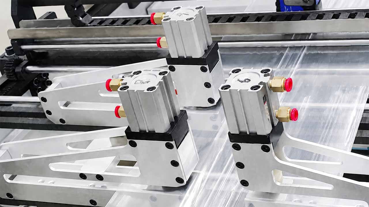 Integrated winding station close-up — LayerQuestar CRB machine roll output winding system